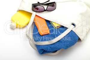 Beach Bag with Towel and Bottles Cream