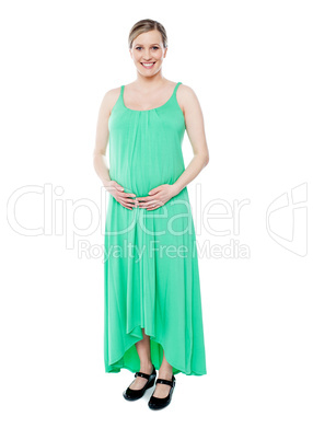 Brunette pregnant woman dressed like princess