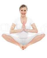 Young attractive pregnant woman doing yoga