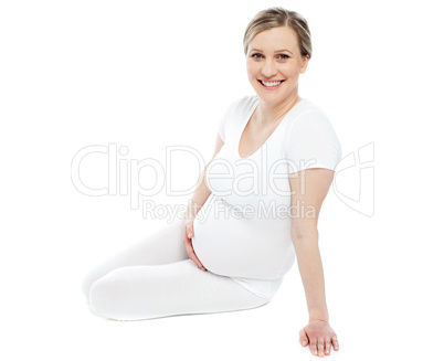 Studio portrait of pregnant woman