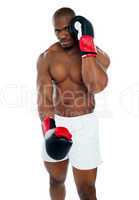 Male boxer in a defensive stance