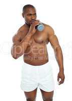 Muscular male drinking health drink