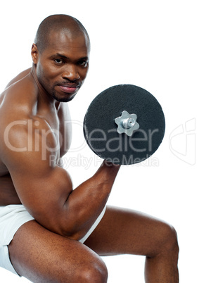 Portrait of happy fit african man working out