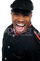 Shouting african man wearing cap