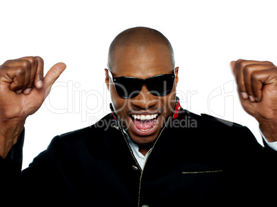 Portrait of excited young african man