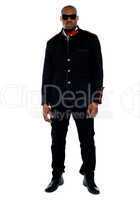 Fashionable african male dressed in black attire