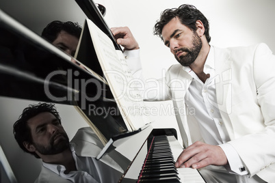man with piano