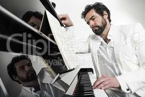 man with piano