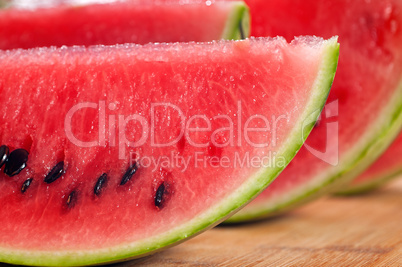 fresh watermelon on a  wood table