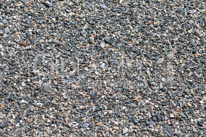 Background of gray granite gravel
