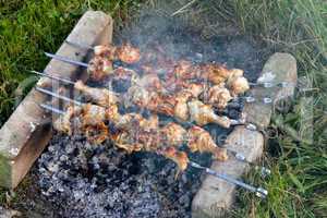 Close up photo of cooking meet on the open fire