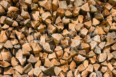 close-up of a pile of wooden logs for use as firewood