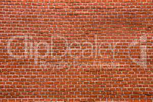 Fragment of red brick wall