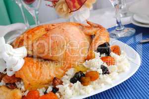 Grilled chicken with rice and dried fruits