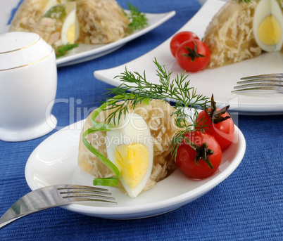 A piece of jellied chicken and egg