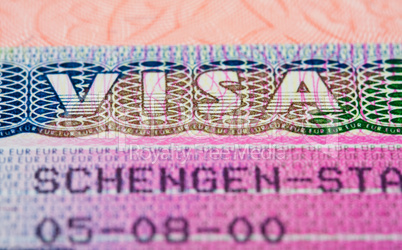 Schengen visa in passport. Fragment