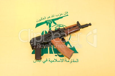 Automatic rifle and flag of Hezbollah