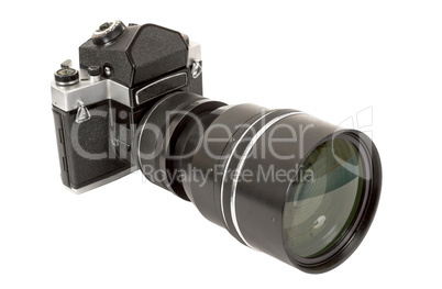 SLR analog camera with big lens on white background