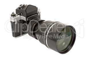 SLR analog camera with big lens on white background