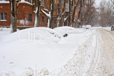 Winter. Car under the snow