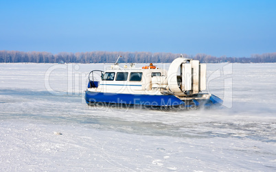 Hovercraft crossing frozen river