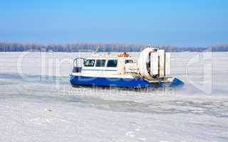 Hovercraft crossing frozen river