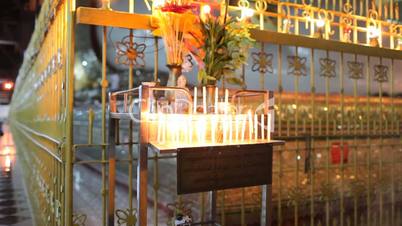Candles inside Chauk Htatt Ghyee pagoda in Yangon
