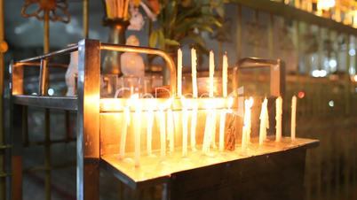 Candles inside Chauk Htatt Ghyee pagoda in Yangon