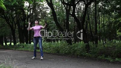 Boy and girl playing in badminton