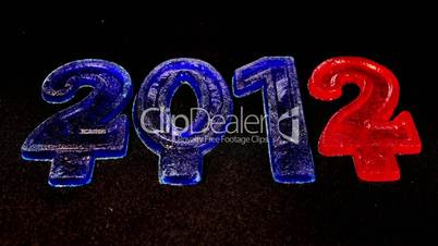 Happy New Year 2013, Time lapse ice is melting figures