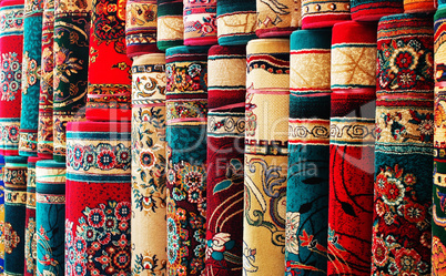 Persian blankets at a market