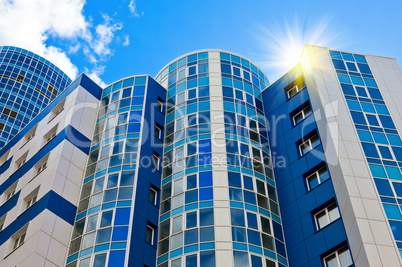 Modern skyscraper on blue sky background