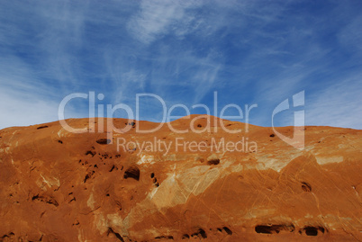 Crossed stripes on red rock and blue sky, Utah