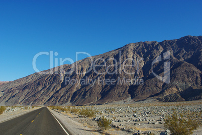 Highway and big mountains, Death Valley, California