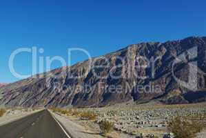 Highway and big mountains, Death Valley, California