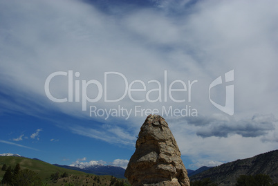 Rock with beautiful sky near Mammoth Terraces, Yellowstone National Park, Wyoming