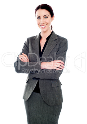 Corporate lady standing with her arms crossed