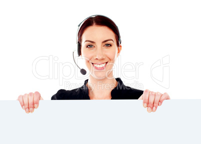 Attractive help-desk female holding blank placard