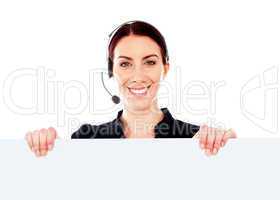 Attractive help-desk female holding blank placard