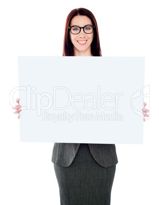 Businesswoman holding a blank poster