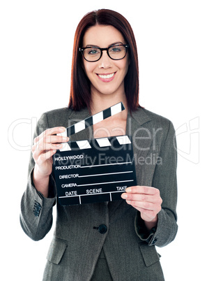 Business lady holding clapperboard