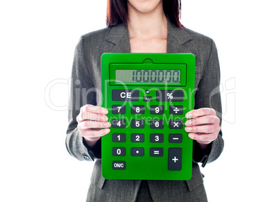 Business woman holding calculator. Focus on calculator