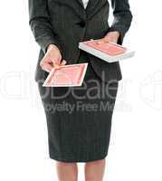 Focus on playing cards. Woman offering them