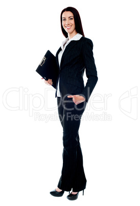 Full length of young businesswoman