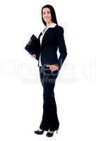 Full length of young businesswoman