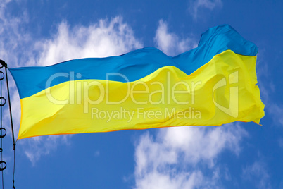 Ukrainian flag waving on cloudy pattern