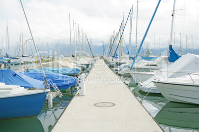 yachts and boats in the harbor in Ouchy, Switzerland