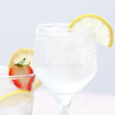 cocktail with ice,lemon and strawberries