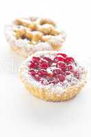 beautiful cake with berries on a white background