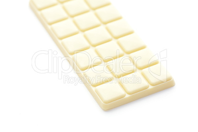 bar of white chocolate isolated on white